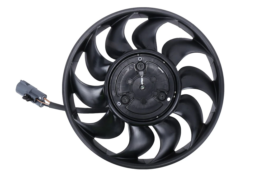 A mechanic inspecting an electric radiator cooling fan assembly mounted behind a radiator with the hood open